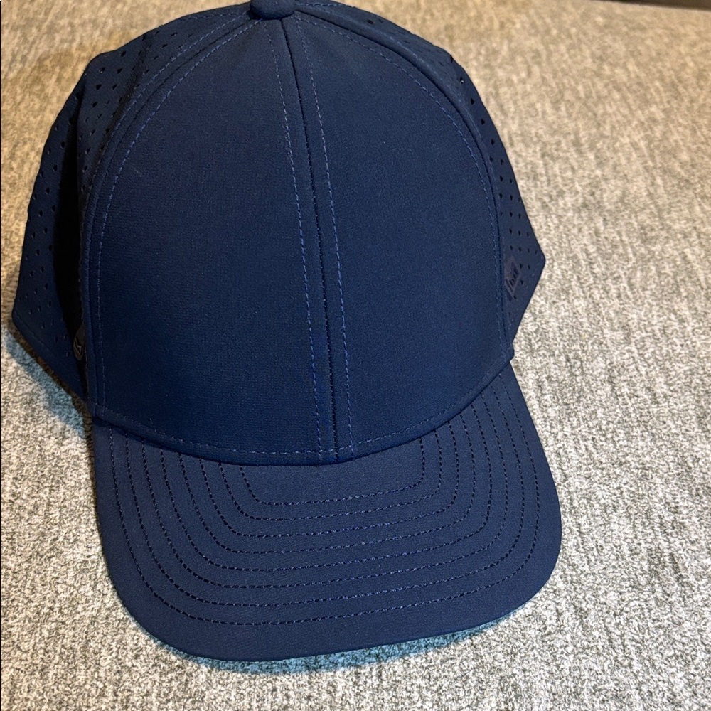 Melin A Game Hydro Navy Hat-Like New.  6 others to sell.  All New or like new.